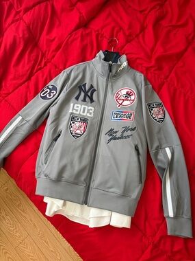 Gray Track Jacket with Team Patches